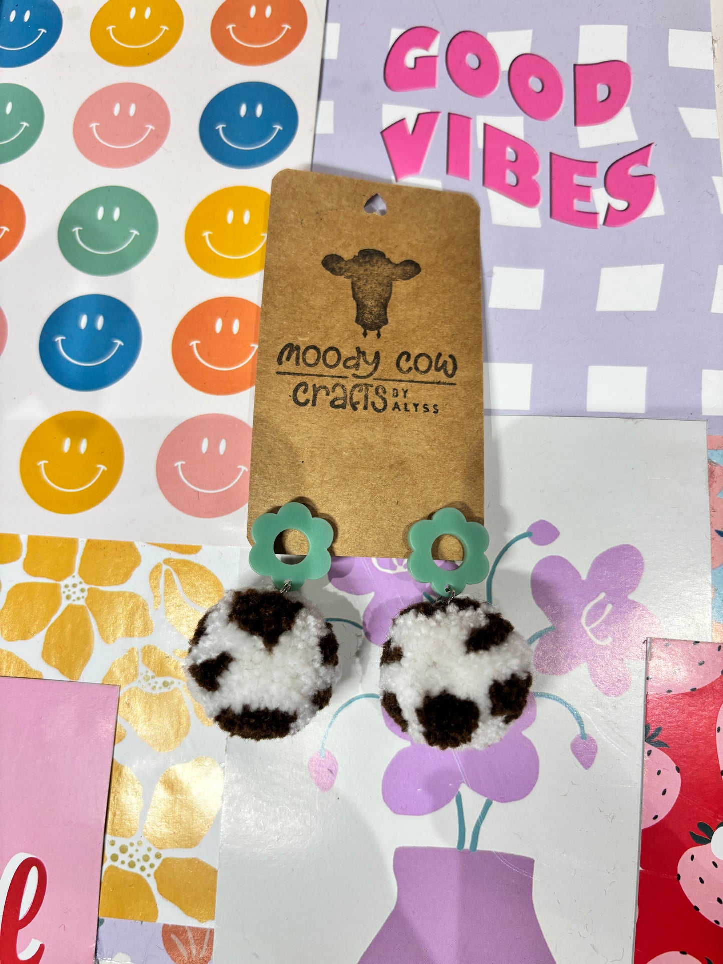 Brown Cow Print Pom Pom Earrings
